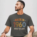 Man is wearing a pepper shirt with made in 1960, built to last design